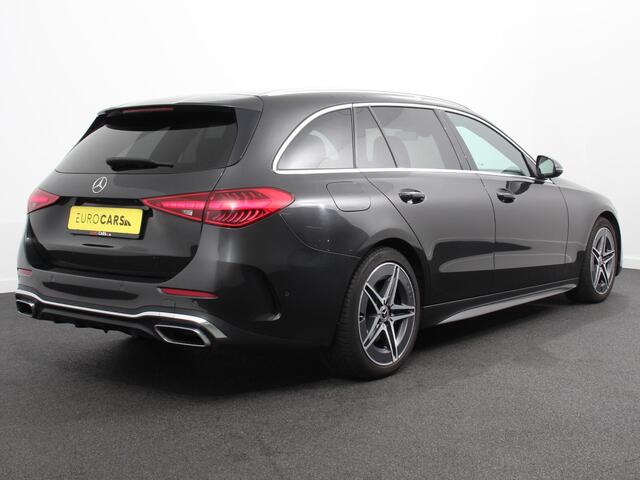Mercedes-Benz C-KLASSE Estate 200 AMG Line | Climate control | Achteruitrijcamera | Wegklapbare trekhaak | Navigatie | Dodehoek assistent | LED | Sfeerverlichting | Adaptieve cruise control | Verwarmde voorstoelen | Elektrische kofferbak