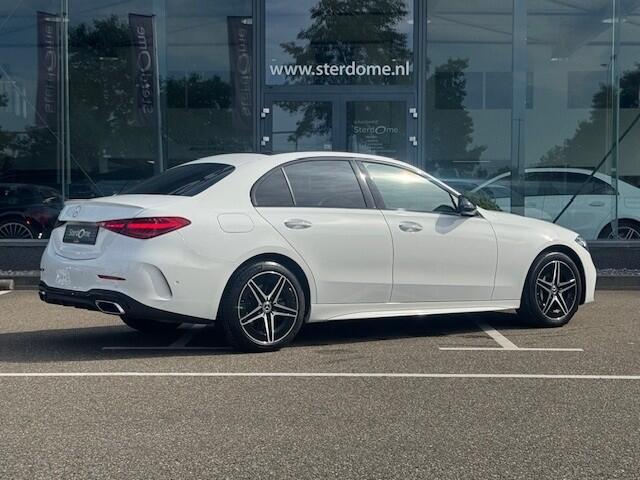 Mercedes-Benz C-KLASSE 300 e AMG Line I Panorama dak I Distronic + I 360° camera I Burmester I Head-up I Digital Light I Memory I Sfeerverlichting I I Stoelverwarming I Comfort onderstel I Thermotronic I MBUX I Keyless GO l