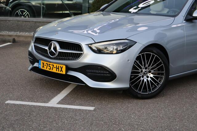 Mercedes-Benz C-KLASSE Estate 200 Avantgarde l Panoramadak l Beige LEDER Interieur l MBUX l LED Adaptief l Camera l Smartphone intergratie l Memory pakket l Winterpakket l Keyless GO l Elektrisch bedienbare achterklep l Draadloos opladen telefoon l Sfeerverlichting l Afneembare