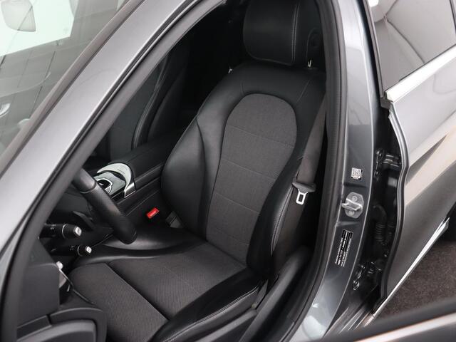 Mercedes-Benz C-KLASSE 180 Business Solution | Stoelverwarming | Trekhaak | Camera | Navigatie | Park Assist | Half leder | Climate control | Full LED | Cruise control | Dodehoek detectie