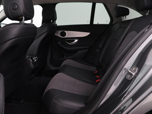 Mercedes-Benz C-KLASSE 180 Business Solution | Stoelverwarming | Trekhaak | Camera | Navigatie | Park Assist | Half leder | Climate control | Full LED | Cruise control | Dodehoek detectie