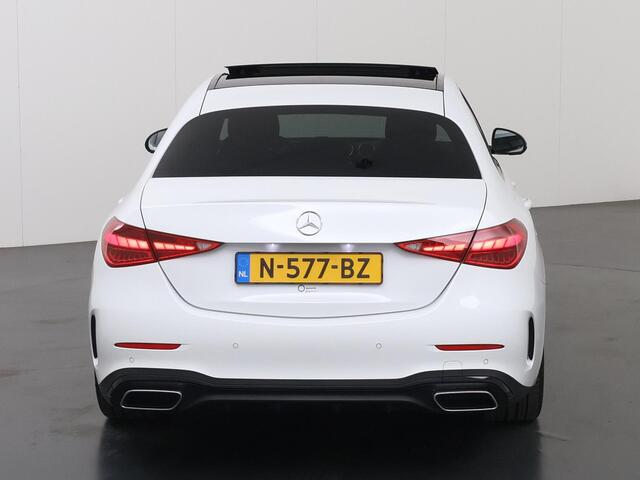 Mercedes-Benz C-KLASSE 180 AMG Line | Night | Panoramadak | Digital Light | Multispaaks AMG velgen | Stoelverwarming | Sfeerverlichting |