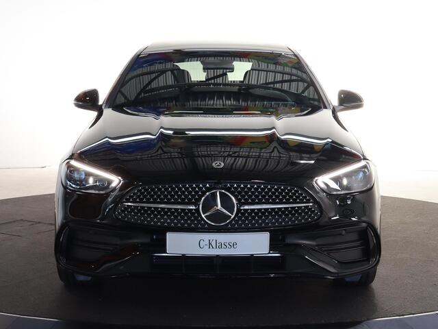Mercedes-Benz C-KLASSE 300e Business Solution AMG | Panoramaschuifdak | Nightpakket | Digital Light | 19" LM velgen | Dodehoekassistent | 360° camera | Stoelverwarming | Sfeerverlichting |