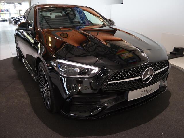Mercedes-Benz C-KLASSE 300e Business Solution AMG | Panoramaschuifdak | Nightpakket | Digital Light | 19" LM velgen | Dodehoekassistent | 360° camera | Stoelverwarming | Sfeerverlichting |