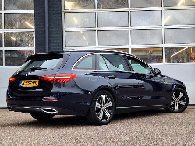 Mercedes-Benz C-KLASSE Estate 200 Launch Edition Luxury Line | Trekhaak | Rijassistentiepakket | Achteruitrijcamera | Sfeerverlichting | Stoelverwarming | Dodehoekassistentie | Elektrische achterklep