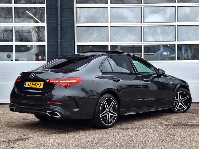 Mercedes-Benz C-KLASSE 300 e AMG Line | Night Pakket | Panoramadak | Memory pakket | Achteruitrijcamera | Sfeerverlichting | Dodehoekassistentie | Stoelverwarming | LED Koplampen