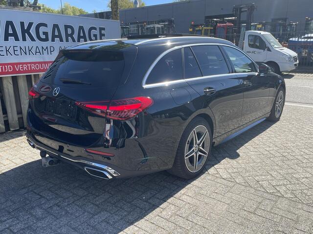 Mercedes-Benz C-KLASSE Estate 300 e Star Edition AMG Line 18"/Panoramadak/Trekhaak/Stuur + stoelverwarming/Adaptieve cruise/Dodehoek/Sfeerverlichting premium/Elektrische klep/Apple Carplay & Android Auto