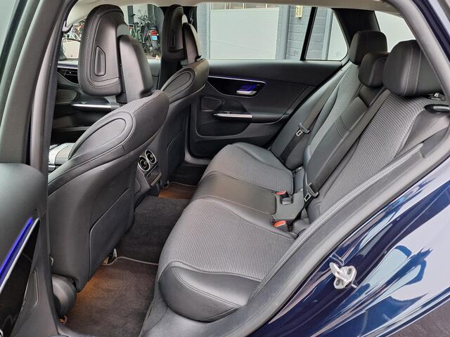 Mercedes-Benz C-KLASSE Estate 200 Luxury Line | Trekhaak | Rijassistentiepakket | Achteruitrijcamera | Sfeerverlichting | Stoelverwarming | Dodehoekassistentie | Elektrische achterklep