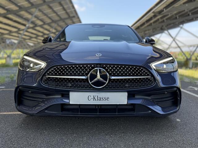 Mercedes-Benz C-KLASSE 300e Business Solution AMG | Night | Panoramaschuifdak | Burmester | AMG-line plus | Head-up display | Trekhaak |