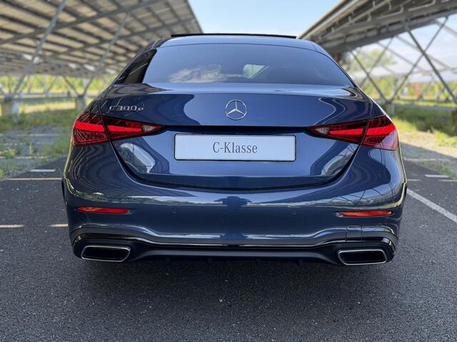 Mercedes-Benz C-KLASSE 300e Business Solution AMG | Night | Panoramaschuifdak | Burmester | AMG-line plus | Head-up display | Trekhaak |