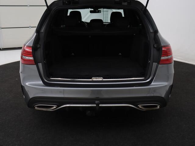 Mercedes-Benz C-KLASSE 160 AMG Limited | Stoelverwarming | Leder/Alcantara | Trekhaak | Camera | Park Assist | Navigatie | Digitale Cockpit | Climate control | Cruise control | 18'' | Bluetooth