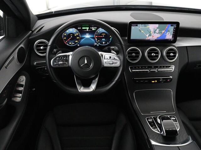 Mercedes-Benz C-KLASSE 300e Business Solution AMG Limited | SOH 82,2% | 360 Camera | Stoelverwarming | Leder/Alcantara | Carplay | Matrix LED | Navigatie | Cruise control | Park Assist | Sfeerverlichting | PHEV | Plug In