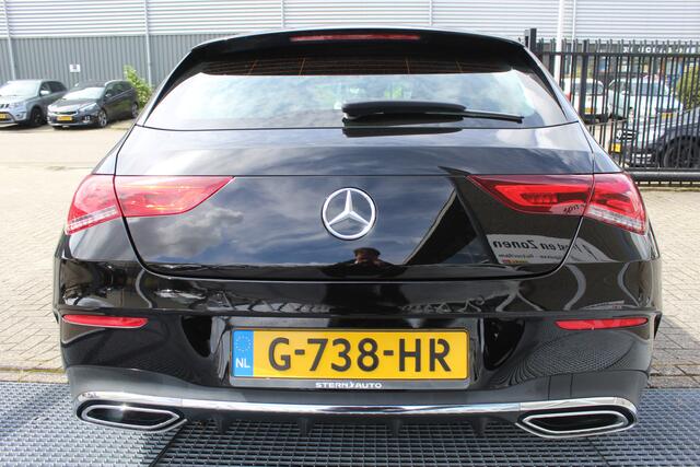 Mercedes-Benz CLA-KLASSE Shooting Brake 180 AMG Orig. Ned./Automaat/Apple carplay/Sfeerverlichting/Airco/Navigatie/Cruise control/Wide digital screen/Elektrische achterklep/Stoelverwarming/Keyless entry+start/Spiegels inklapbaar/Achteruitrijcamera/Lichtmetalen velgen