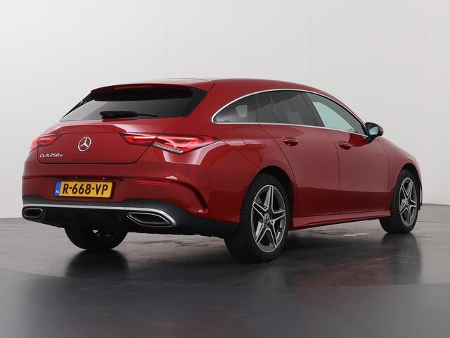 Mercedes-Benz CLA-KLASSE Shooting Brake 250 e AMG | Burmester 3D | Rij assistentie pakket | Easy Pack achterklep | Donker getint glas | Sfeerverlichting | Apple Carplay