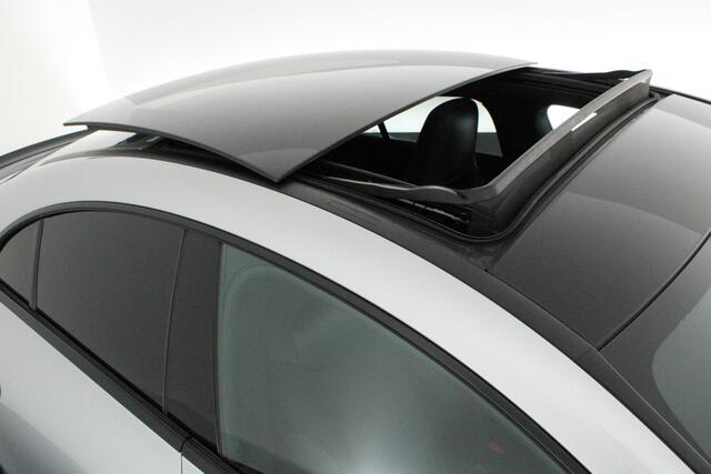 Mercedes-Benz CLA-KLASSE 200 163pk Solution AMG Trekhaak Camera Burmester Stoelverwarming Sfeerverlichting Panoramadak Navigatie