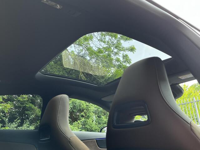 Mercedes-Benz CLA-KLASSE 180 Business Solution AMG | Panoramadak | Bruin Interieur | Night Pakket | MULTIBEAM LED Koplampen | Apple CarPlay | Android Auto | Sierdelen Walnotenhout Zwart | Sfeerverlichting | Stoelverwarming | Achteruitrijcamera