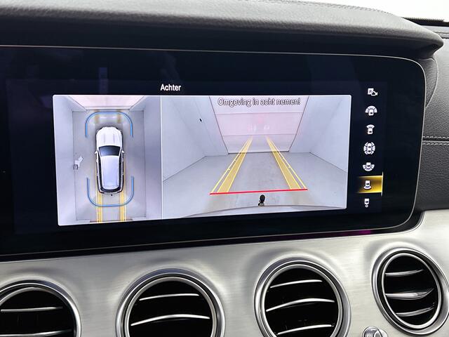 Mercedes-Benz E-estate 300 e AMG-line | Panorama schuif/kanteldak | Trekhaak af fabriek wegklapbaar | Lederen bekleding | Alarm SCM3 | 360gr Camera | Inclusief 24 maanden Mercedes-Benz Certified garantie voor Europa.