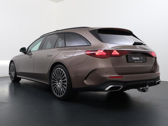 Mercedes-Benz E-estate 300 e Business Solution AMG | Night Pakket | Trekhaak | Panoramadak | 360° Camera | Augmented Reality voor Navigatie | DISTRONIC Afstandsassistent | Dodehoekassistent | Verkeersbordassistent | DIGITAL LIGHT | Elektrisch Verstelbare Stoelen + Memory | Stoe
