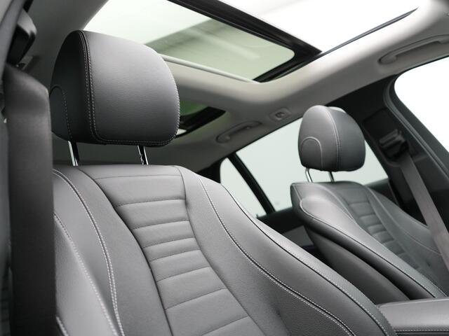 Mercedes-Benz E-estate 300 e AMG Line Plug In Hybrid 320pk | Panodak | Trekhaak af Fabriek | Adaptive Cruise | Head Up | Multibeam LED | Lederen Sportstoelen | Widscreen Navi | Sfeerverlichting | Camera | PHEV |