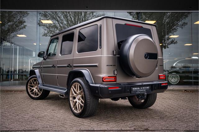 Mercedes-Benz G-KLASSE AMG 63 ** Akrapovic ** AMG Performance Pack ** Carbon ** Xpell PPF Face-lift MY25 ** Grijs kenteken (excl. btw) ** Target Blue Eye