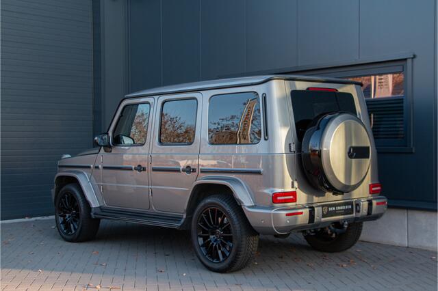 Mercedes-Benz G-KLASSE 500 AMG | ACC | 360 Cam | Burmester 4D | Massage & Ventilatie | Carbon | Lane & Side Assist | Trekhaak 3500kg | Dynamic Select | Garagedeuropener | Treeplanken | Sfeerverlichting | Dealer Onderhouden | Nightpakket | Mojavezilver Metallic | Stoel & Bankver