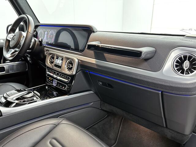 Mercedes-Benz G-KLASSE 500 Trekhaak | AMG Line | Night Pakket | Schuif-Kanteldak | Distronic | Treeplanken van rvs links en rechts. Inclusief 24 maanden Mercedes-Benz Certified garantie voor Europa.