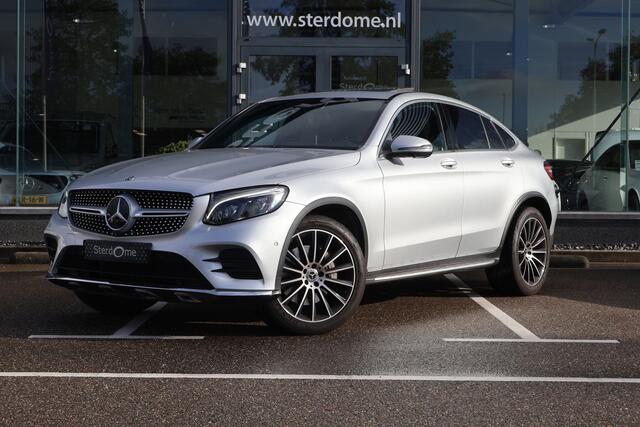 Mercedes-Benz GLC-KLASSE Coupé 250 4MATIC AMG Premium Plus l Schuif- Kanteldak l DISTRONIC l Memoy pakket l 360 gr Camera lStoelverwarming l LEDER l Burmester l LED l Sfeerverlichting l Alarm klasse 3 l Elektrisch bedienbare achterklep l Spiegel pakket l Dodehoek assitent l