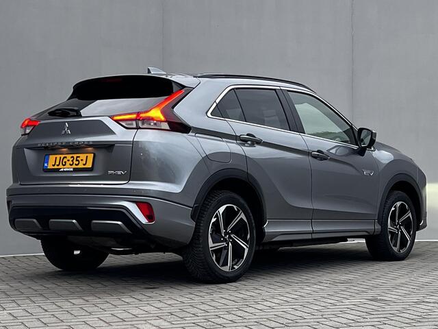 Mitsubishi ECLIPSE Cross 2.4 PHEV Business Executive 4WD Automaat / Fabrieksgarantie tot 11-2031 mogelijk ** / Goed onderhouden / Camera 360° / Stuur-, stoel- en achterbankverwarming / Adaptieve Cruise Control / Apple Carplay Android / 18" LM wielen met All Season banden /
