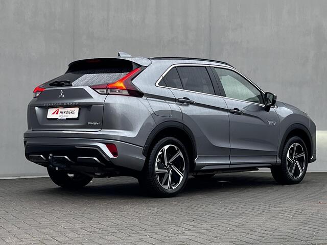 Mitsubishi ECLIPSE Cross 2.4 PLUG-IN HYBRID 4WD S-AWC Executive Automaat / Fabrieksgarantie tot 12-2032* / Trekhaak 1.500 kg / Leder / Elektrische stoelen / Navigatie / Stuur-, stoel - & achterbankverwarming / HUD / Camera 360° / 18" LM wielen + All Season banden /