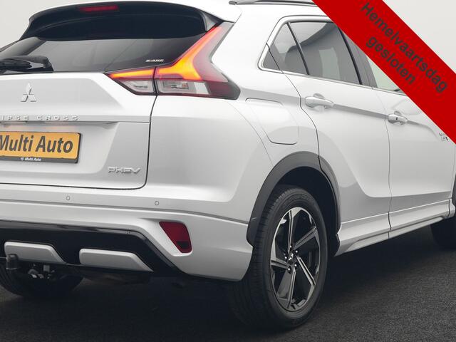 Mitsubishi ECLIPSE Cross 2.4 Intense+ PHEV 188pk Dealer O.H. | Trekhaak Afn. | 360 Camera | Adaptive Cruise | Lederen Sportstoelen & Stuur Verwarmd | Navigatie Via TomTom | Apple Carplay | Keyless | Blis | DAB | Plug In Hybrid