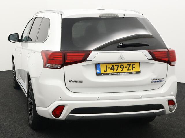 Mitsubishi OUTLANDER 2.0 PHEV Pure stuur en stoel-verw, airco, navi, aklep-autom, lane contr, cruisecont, half leer, arijcam, Apple Carplay/Android Auto, De Mitsubishi Outlander 2.0 PHEV Pure (2018, automaat) is een praktische en comfortabele plug-in hybride SUV die ideaal is