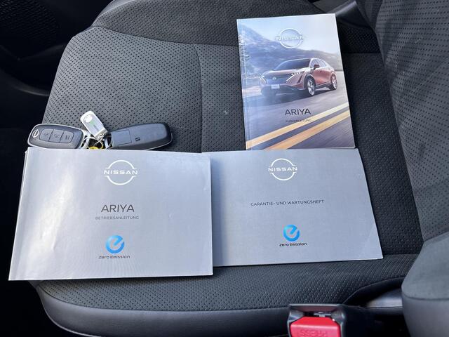 Nissan Ariya Evolve 87 kWh Automaat / WLTP bereik 516 km / Trekgewicht 750 kg / CCS snelladen / Stoelventilatie / Stuur-, stoel- en achterbankverwarming / Voorruitverwarming / HUD / Camera 360° /