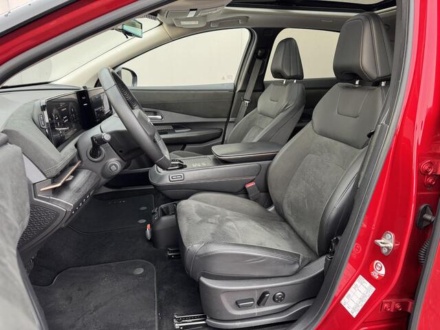 Nissan Ariya Evolve 91 kWh / Warmtepomp / Stuur- & Stoelverwarming / Voorruitverwarming / Geventileerde Voorstoelen / Binnenspiegel Camera / Schuif & Kanteldak / Head-Up Display / Bose Premium Audio / Adaptieve Cruise Control / Apple Carplay & Android Auto /