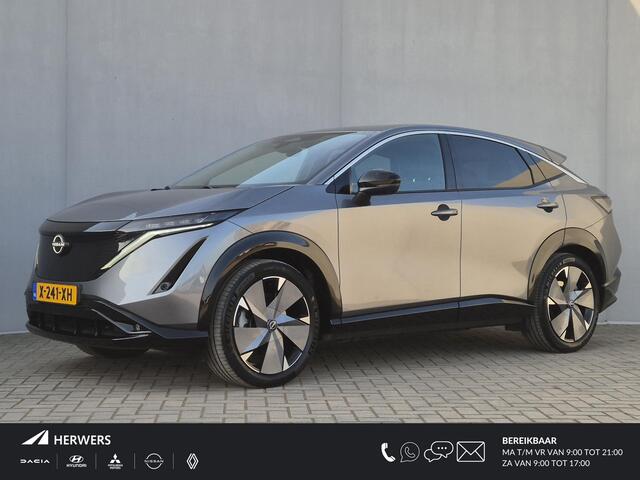 Nissan Ariya Advance 66 kWh Automaat / Accu SOH 99% / Fabrieksgarantie tot 02-2027 / CCS snelladen / Elektrische achterklep / Stuur-& Stoel verwarming / Adaptief cruise control / 360 camera / warmtepomp / Apple Carplay Android Auto /