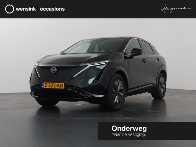 Nissan Ariya Advance 91 kWh | SOH 98% | Ele.verstelbare stoelen | Digitaal Dashboard | Navigatie | 360 Camera | LED | DAB | Apple CarPlay/ Android Auto | Rijassistent-Systeem | Ele. achterklep | Adaptieve Cruise Control |