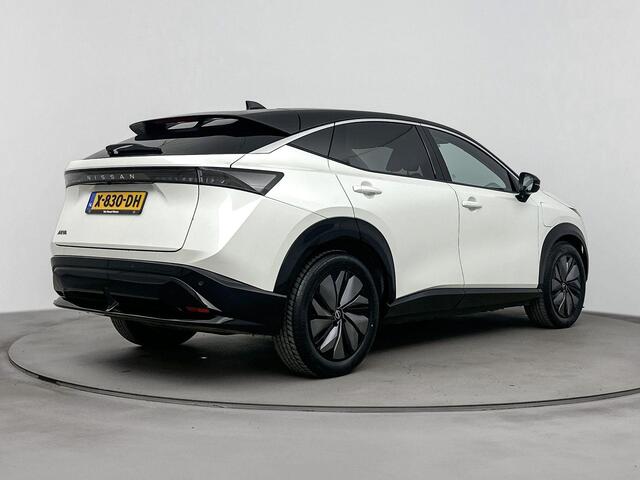 Nissan Ariya Advance 91 kWh airco automatisch | Apple Carplay/Android | cruise control adaptief met Stop&Go en stuurhulp | lederen/stof bekleding | lichtmetalen velgen 19" | navigatiesysteem full map |voorstoelen verwarmd | warmtepomp |