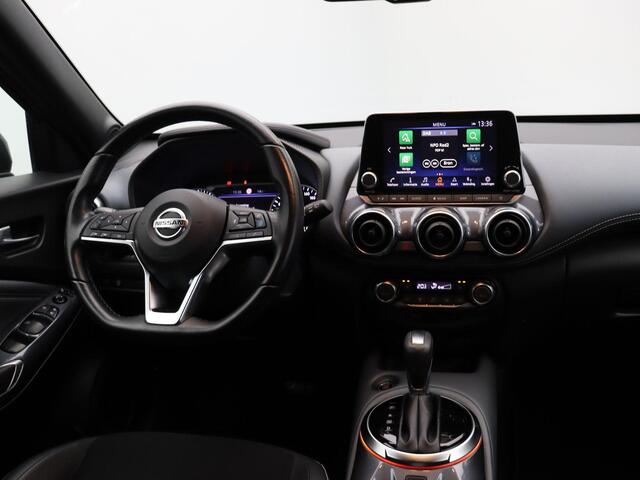Nissan JUKE 1.0 DIG-T N-Design | Rondomzicht camera | Stoelverwarming | Trekhaak | BOSE audio | Navigatie | Climate control | Half leder |
