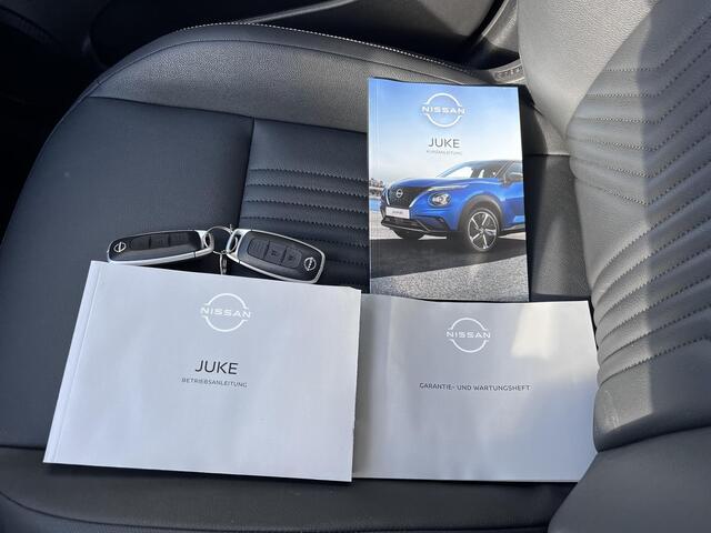 Nissan JUKE 1.0 DIG-T Tekna / Fabrieksgarantie tot 03-2028 <100.000 km / Automaat / Leder / Camera 360° / Cold Pack / Stuur-, stoel- & voorruitverwarming / Navigatie / Apple Carplay Android / 19" LM + All Season banden /