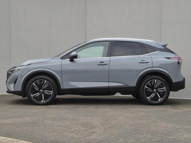 Nissan QASHQAI 1.3 MHEV Xtronic Tekna / Fabrieksgarantie tot 04-2028 / HUD / Trekgewicht 1800 kg / Stuur-, Stoel en Voorruit verwarming / Elektrische achterklep / Rondomzicht camera / Adaptief CC / Apple Carplay Android Auto /