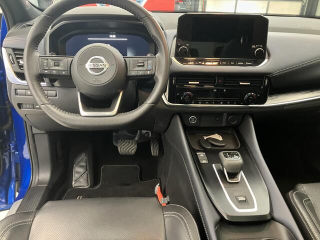 Nissan QASHQAI 1.3 MHEV Xtronic Tekna Plus / Eerste Eigenaar / Dealer Onderhouden / Afneembare Trekhaak 1800 KG / Lederen Bekleding / Bose Audio / Navigatie / Panoramadak / 360 Graden Camera / Elektrische Kofferbak / Elektrisch Verstelbare Stoel met Geheugen /