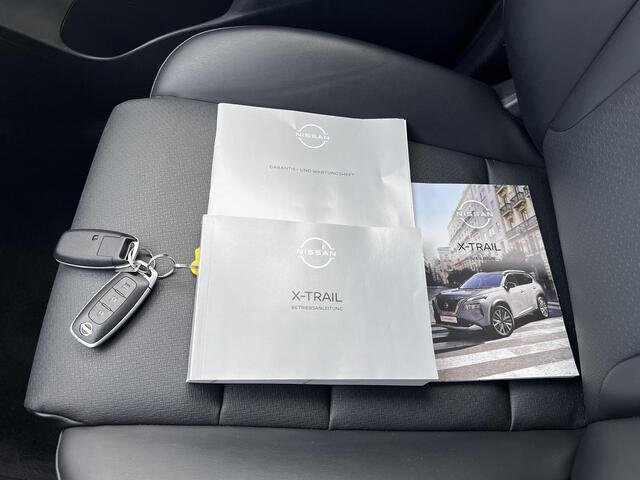 Nissan X-TRAIL 1.5 e-Power N-Connecta Automaat / Fabrieksgarantie tot 03-2028 ** < 100.000 km / Navigatie / Leder / Stuur-, stoel- en achterbankverwarming / Elektr. stoelen en klep / 18" LM wielen + All Season banden /