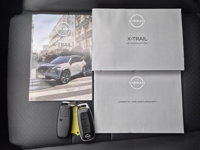 Nissan X-TRAIL 1.5 e-Power Tekna Automaat / Fabrieksgarantie tot 05-2028<100.000 / Dealer onderhouden / All Season banden / Head Up Display / Adaptief cruise control / Stuur-, Stoel & Achterbank verwarming / Elektrische achterklep /