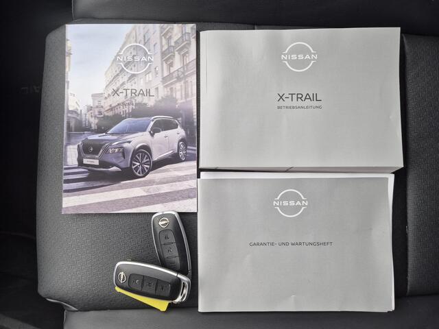 Nissan X-TRAIL 1.5 e-4orce Tekna 4WD Automaat / Fabrieksgarantie tot 10-2027<100.000 / Dealer onderhouden / All Season banden / Trekgewicht 1800 kg / Head Up Display / Elektrische achterklep / Adaptief cruise control / Rondomzicht camera /