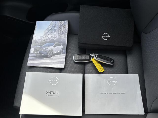 Nissan X-TRAIL 1.5 e-4orce Tekna 4WD / Fabrieksgarantie tot 01-2028 / Dealer onderhouden / 1800kg Trekgewicht / All Season banden / Stuur-, Stoel en Achterbank verwarming / Head Up Display / Elektrische achterklep / Rondomzicht camera / Adaptief CC /