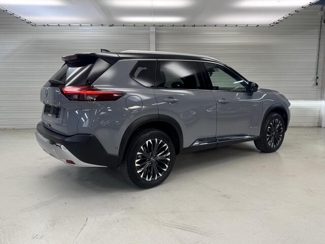 Nissan X-TRAIL 1.5 e-4orce Tekna 4WD 5p / 1800 KG Trekgewicht / Lederen Bekleding / Memoryseats / Navigatie / 360 Graden Camera / Stoel- en Stuurverwarming / Achterbankverwarming / Verwarmde Voorruit / Adaptive Cruise Control / Digitale Binnenspiegel / Climate Control /