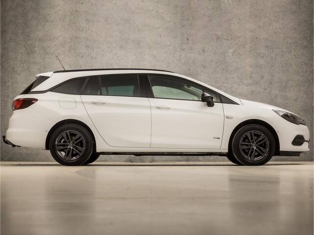 Opel ASTRA Sports Tourer 1.2 Sport (APPLE CARPLAY, NAVIGATIE, ADAPTIVE CRUISE, CLIMATE, CAMERA, TREKHAAK, LEDER, SPORTSTOELEN, PARKEERSENSOREN, LED KOPLAMPEN, DAB+, NIEUWSTAAT)