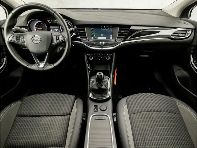Opel ASTRA Sports Tourer 1.2 Sport (APPLE CARPLAY, NAVIGATIE, ADAPTIVE CRUISE, CLIMATE, CAMERA, TREKHAAK, LEDER, SPORTSTOELEN, PARKEERSENSOREN, LED KOPLAMPEN, DAB+, NIEUWSTAAT)