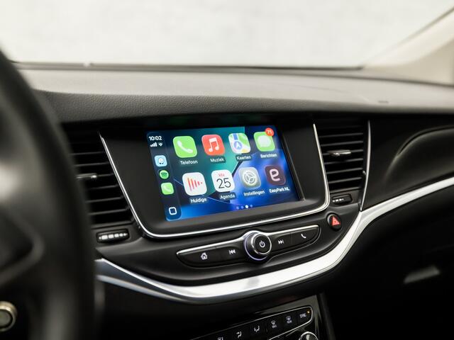 Opel ASTRA Sports Tourer 1.2 Sport (APPLE CARPLAY, NAVIGATIE, ADAPTIVE CRUISE, CLIMATE, CAMERA, TREKHAAK, LEDER, SPORTSTOELEN, PARKEERSENSOREN, LED KOPLAMPEN, DAB+, NIEUWSTAAT)