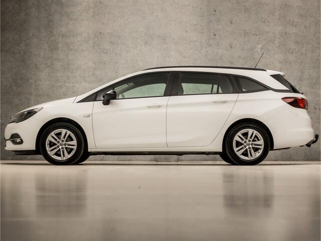 Opel ASTRA Sports Tourer 1.2 Sport (APPLE CARPLAY, NAVIGATIE, CRUISE, CAMERA, SPORTSTOELEN, PARKEERSENSOREN, TREKHAAK, LM VELGEN, LED KOPLAMPEN, NIEUWSTAAT)