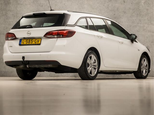 Opel ASTRA Sports Tourer 1.2 Sport (APPLE CARPLAY, NAVIGATIE, CRUISE, CAMERA, SPORTSTOELEN, PARKEERSENSOREN, TREKHAAK, LM VELGEN, LED KOPLAMPEN, NIEUWSTAAT)